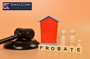 Probate Property - Image of gavel and wooden house